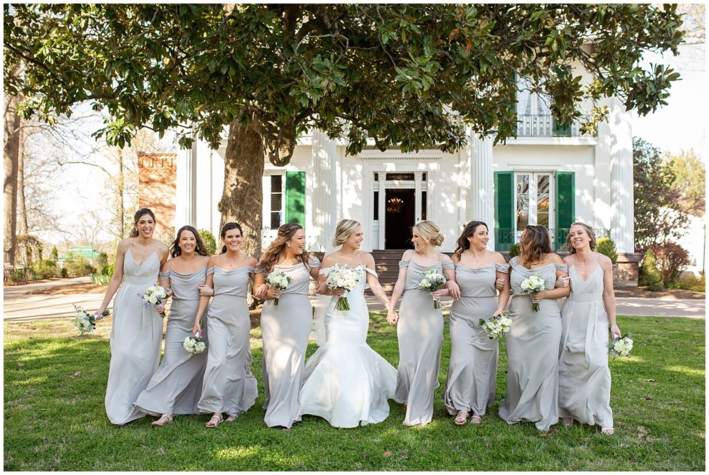 Bridesmaids in soft grey dresses at Riverwood Mansion in Nashville